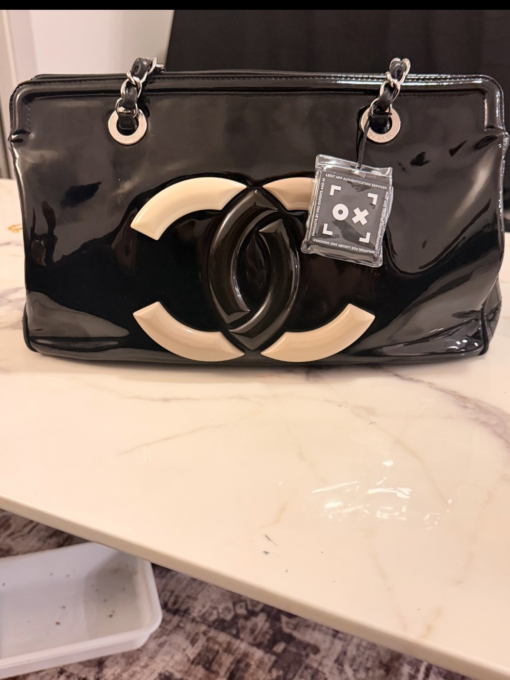 CHANEL Black Patent Shoulder Bag with Cream Logo Accents